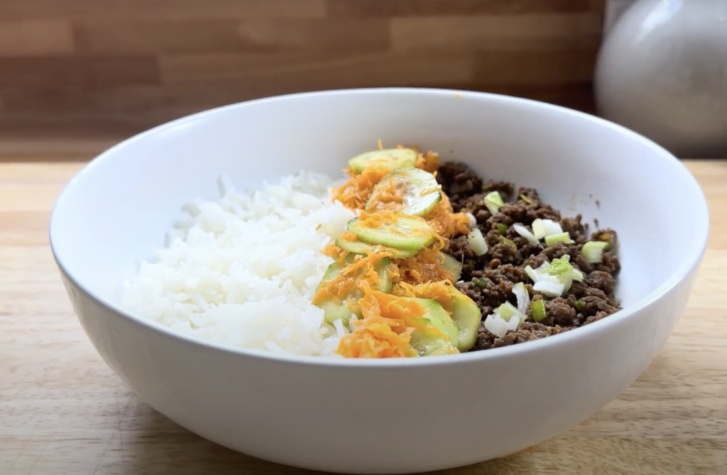 korean beef with rice and cucumber salad